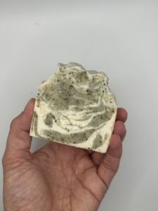 Image of a swirly green and cream coloured soap bar