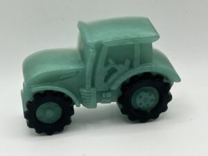 Image of a green tractor with black wheels, made of soap
